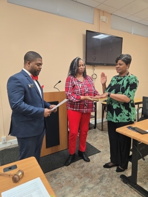 Brooketah Banks at her reappointment as Comissioner.