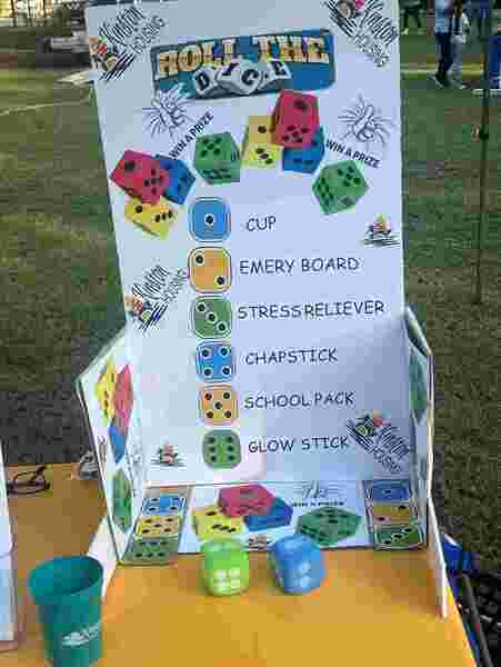 Roll the Dice display for prizes from Kinston Housing Authority.